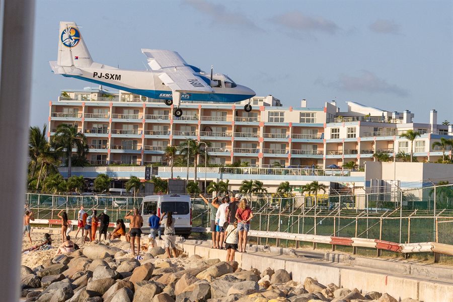 Aircraft flying low over a beach in St. Maarten