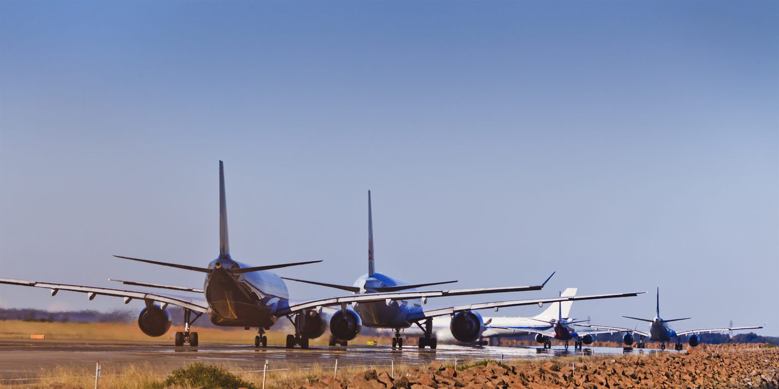Airliners parked on an airport apron